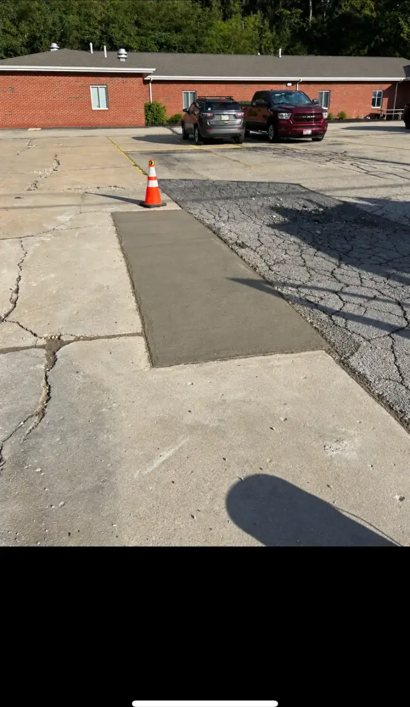 Commercial lot concrete patch by Elite Construction
